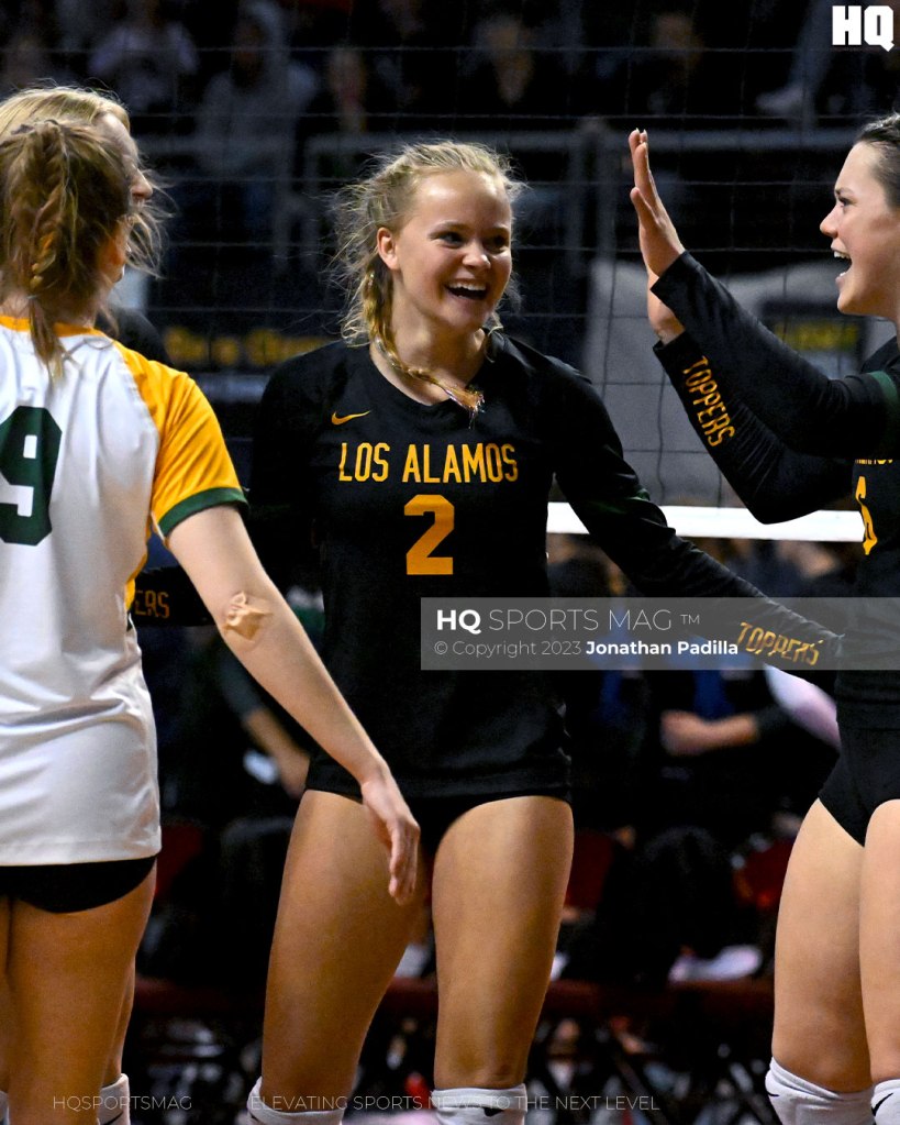 Angelina Passalacqua celebrates with her her Los Alamos teammates after scoring a point during the 2022 NMAA State Volleyball Championships.