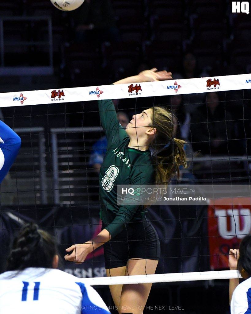 Jayden Hughes spikes the ball for Cloudcroft during the 2022 NMAA State Volleyball Championships.