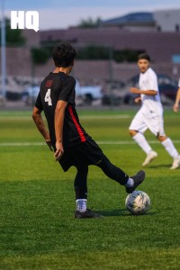 Rio Grande’s Carolos Ruiz (4) dribbles the ball during Rio Grande’s APS Metro Soccer Championships semifinal match against Atrisco Heritage Academy.