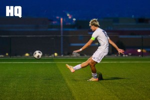 Rio Rancho’s Parker Dunn, (15) a senior, strikes the ball during an APS Metro Soccer Championships semifinal match against La Cueva.