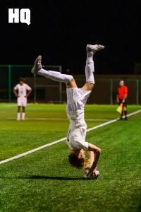 La Cueva senior midfielder Isaac Martinez (7) completes somersault with the ball as he prepares to throw the ball back into play during the boys’ gold bracket semifinals matchup against Rio Rancho of the APS Metro Soccer Championships.