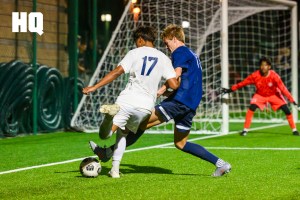 Miguel Wong (17) of Rio Rancho faces up against La Cueva defender Sebastian Kreuter (23) to maintain possession of the ball during the boys’ gold bracket semifinals matchup against Rio Rancho of the APS Metro Soccer Championships.