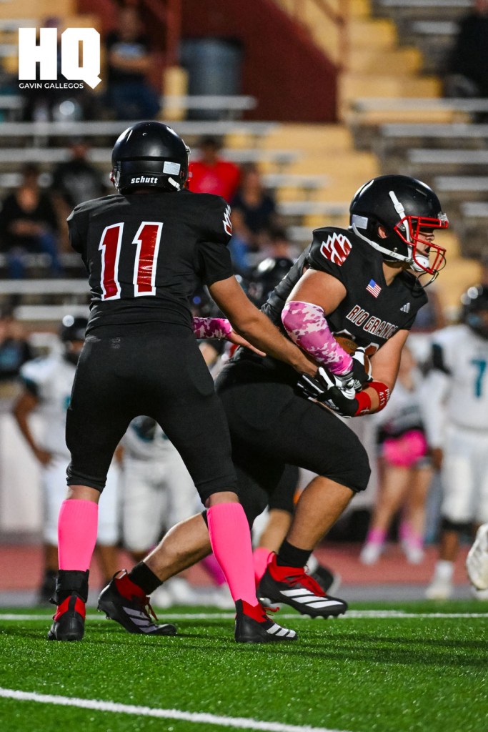 Darrien Flores (11) of Rio Grande hands off the ball to advance the ball against Del Norte in their district matchup at Milne Stadium. Gavin Gallegos/HQ Sports