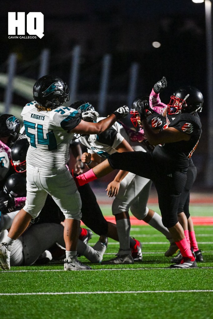 Mario Archuleta (54) defends against a Rio Grande opponent in their district matchup against each other at Milne Stadium in Albuquerque, NM. Gavin Gallegos/HQ Sports