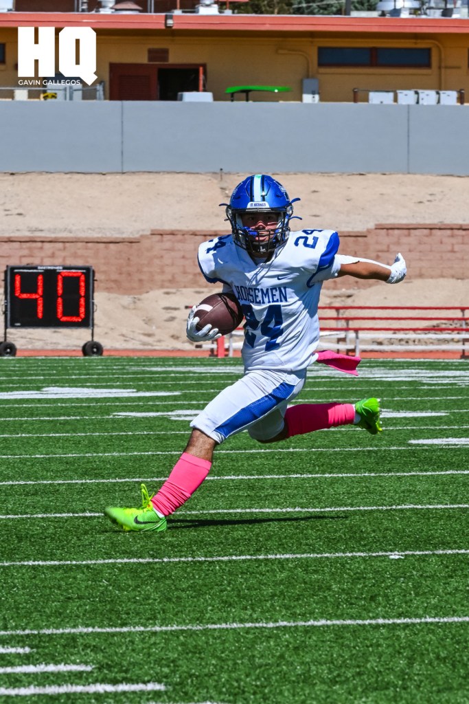 Isaiah Dominguez, (24) a St. Michael’s senior evades the defense and advances the ball during a district game at Wilson Stadium against Hope Christian. Gavin Gallegos/HQ Sports