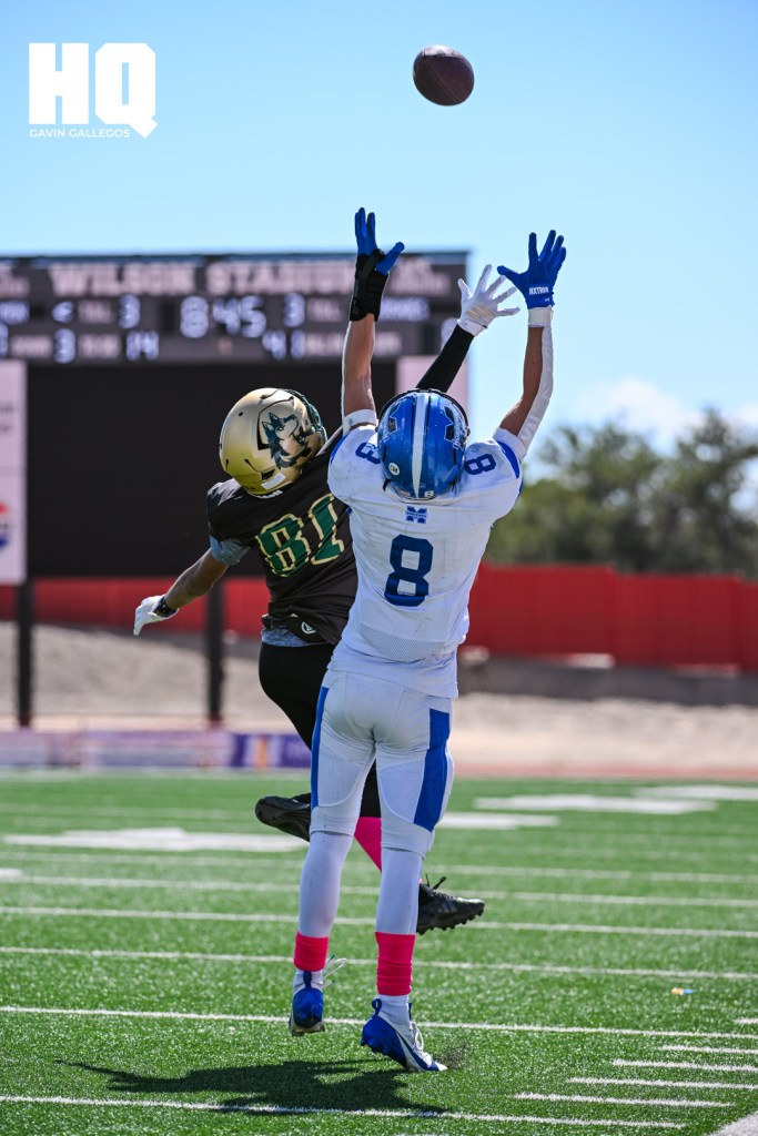 Hope Christian’s Vincent Romo (81) and St. Michael’s Ryan Hunt (8) jumping in an attempt to catch a pass during a matchup at Wilson Stadium. Gavin Gallegos/HQ Sports