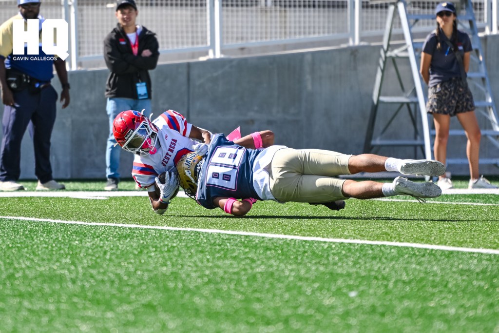 Deon Session (88) of Atrisco Heritage Academy tackles a West Mesa player just short of the goal line at Nusenda Community Stadium. Gavin Gallegos/HQ Sports