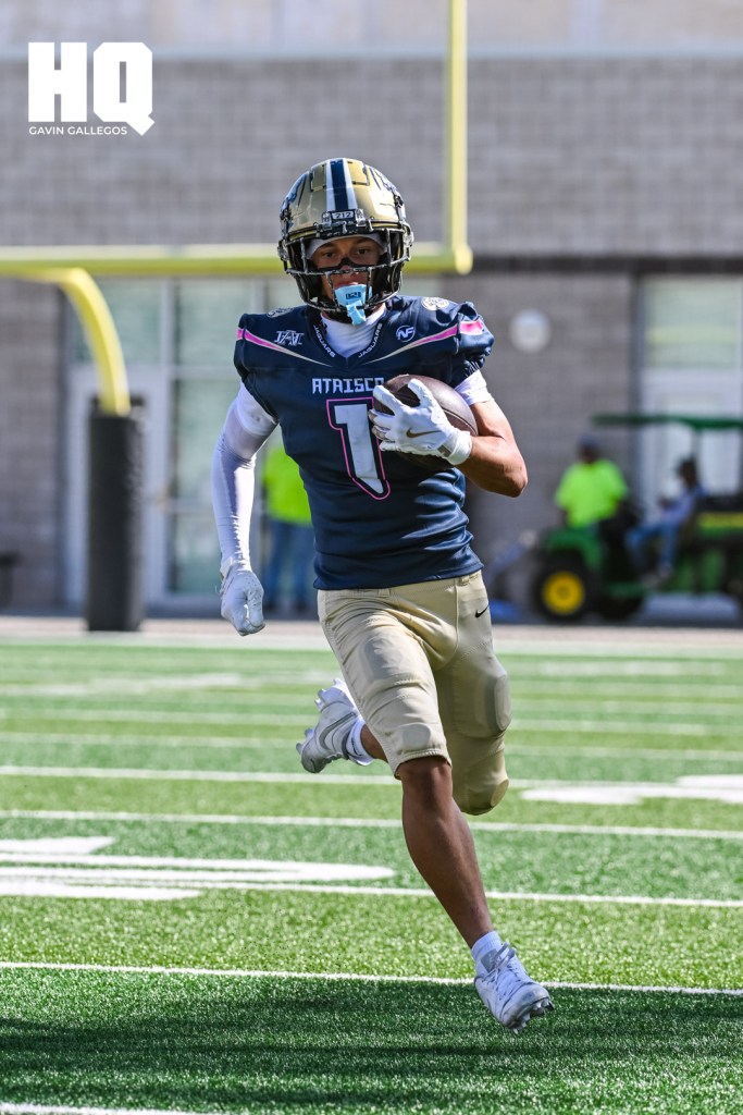 J’ven Smith, (1) a junior wide receiver of Atrisco Heritage Academy runs the ball up field gaining much needed yardage for the Jaguars in a district matchup against West Mesa at Nusenda Community Stadium. Gavin Gallegos/HQ Sports