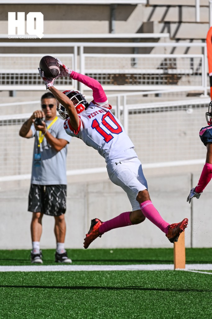 Isaiah Cazares (10) of West Mesa catches a pass mid-air just short of the end zone at Nusenda Community Stadium in a district matchup against Atrisco Heritage Academy. Gavin Gallegos/HQ Sports